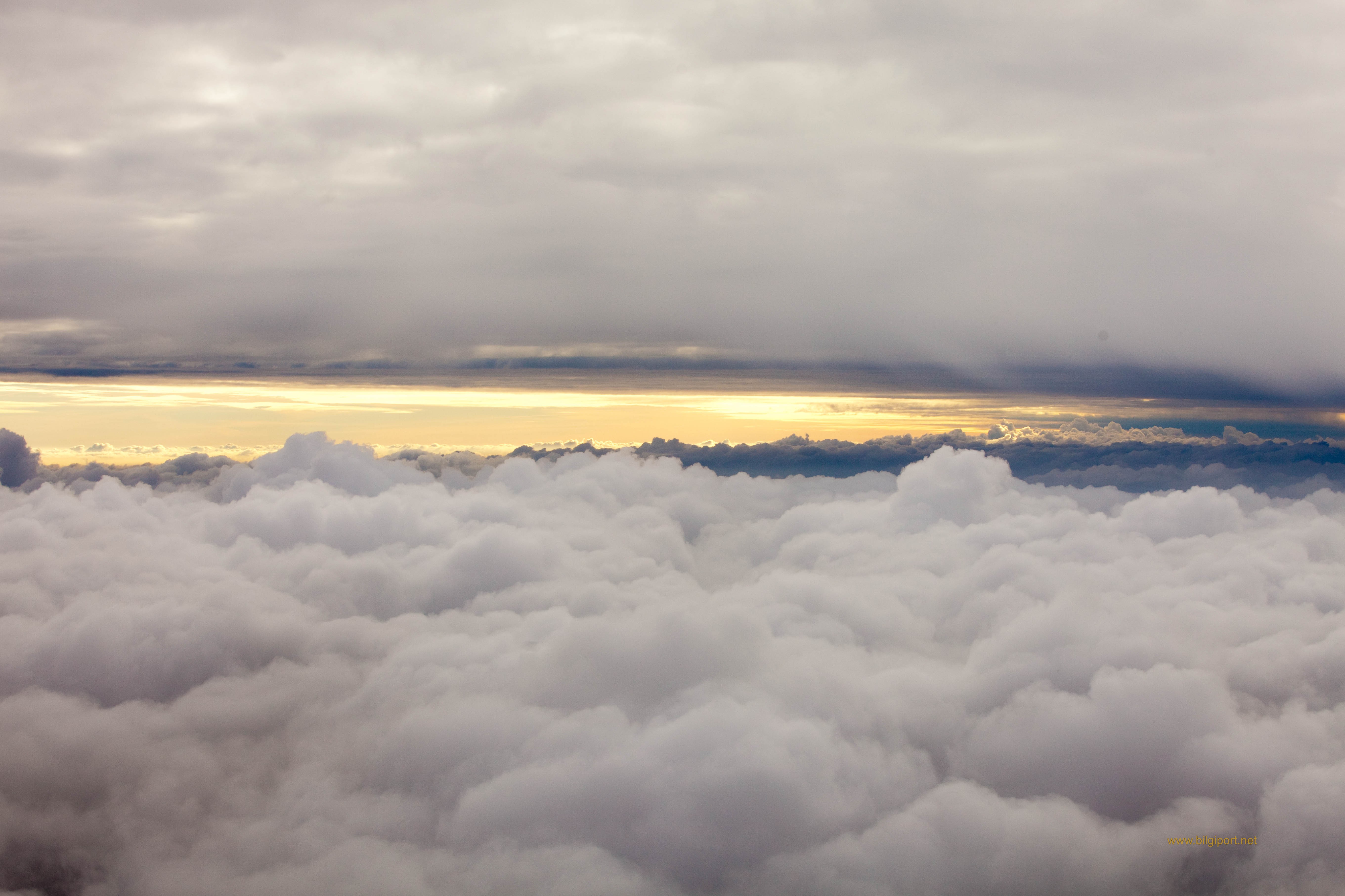 Flying_in_between_two_layers_of_clouds_over_Poland,_on_the_way_to_the_beautiful_Baltic_countri